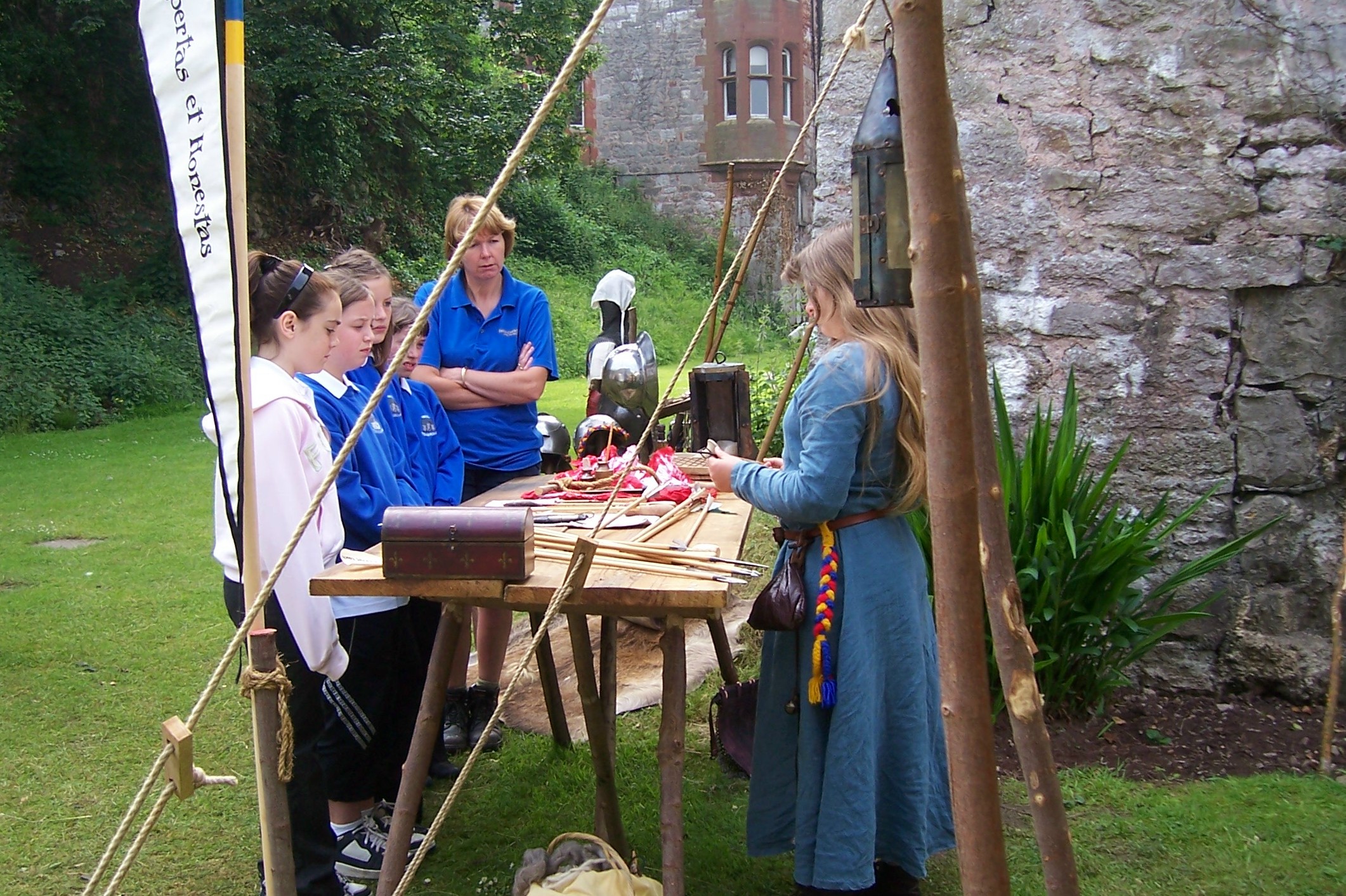 Cassie, giving a talk on medieval field medicine.